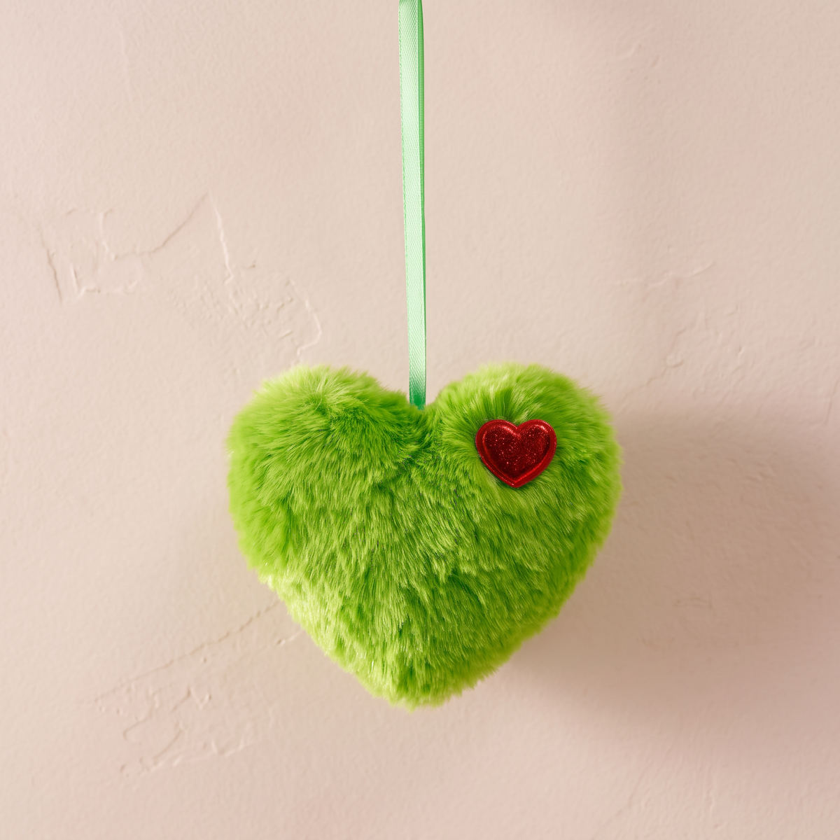 Green fluffy plush heart Christmas ornament with a ribbon hanger